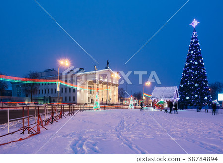 Area of the city with Christmas decorations and a Christmas tree Area of the city with Christmas decorations and a Christmas tree 38784894