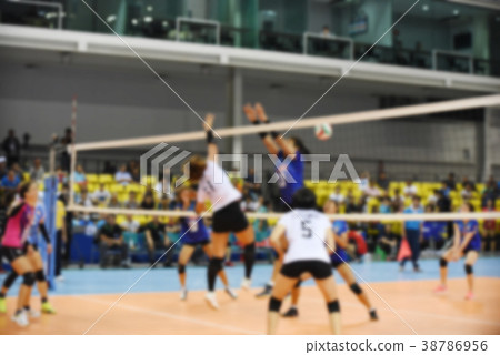 Blurred female volleyball player 38786956