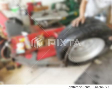 repairing flat car tire with repair kit repairing flat car tire with repair kit 38786975