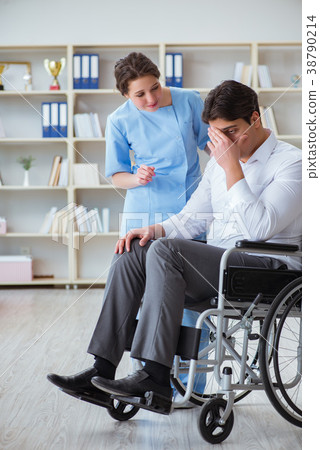 Disabled patient on wheelchair visiting doctor for Disabled patient on wheelchair visiting doctor for 38790214