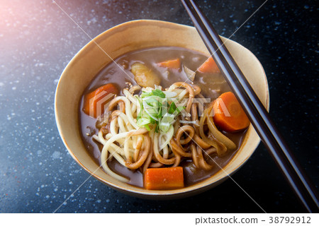 Japanese curry with udon noodle. 38792912