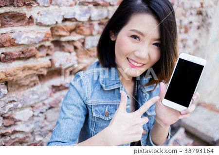 smart asian woman with hand hold smartphone 38793164