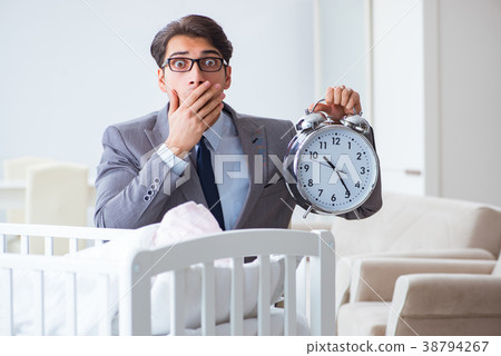 Young businessman trying to work from home caring 38794267