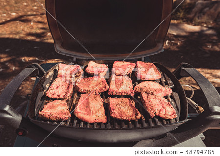 Australian gas barbeque steaks 38794785