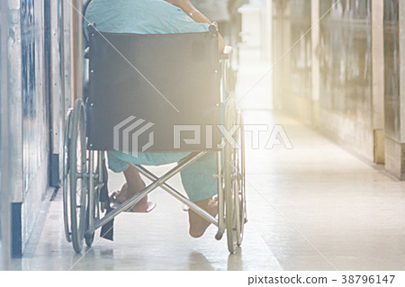 Man On Wheelchair In Front Of The Outpatient Man On Wheelchair In Front Of The Outpatient 38796147