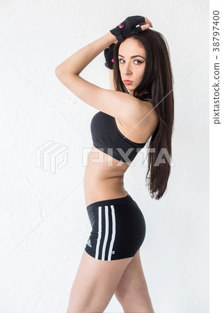 Half-length portrait of the attractive skinny 38797400