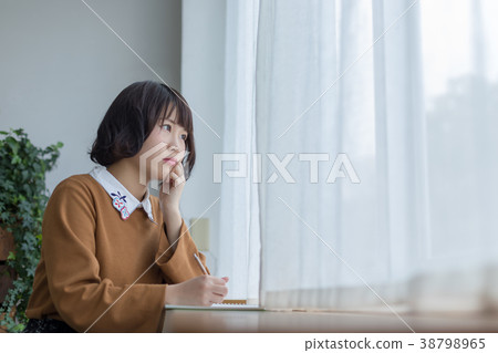 Female college student image studying in the window Female college student image studying in the window 38798965