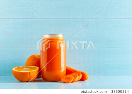 Orange-colored smoothies / juice in a jar Orange-colored smoothies / juice in a jar 38800314