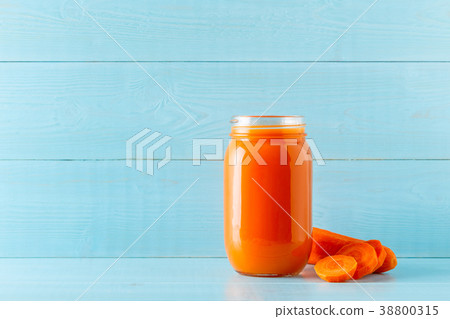 Orange-colored smoothies / juice in a jar Orange-colored smoothies / juice in a jar 38800315