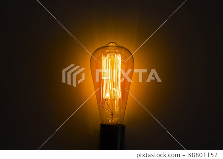 Old vintage edison bulb in the dark 38801152