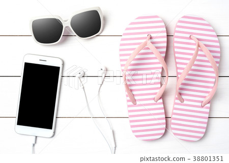 Pink flip flops on white wooden background Pink flip flops on white wooden background 38801351