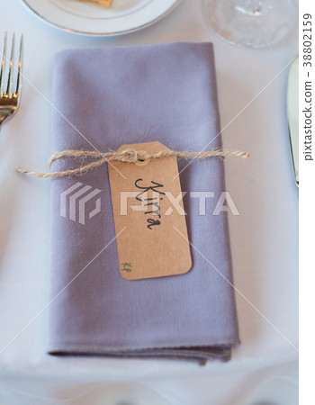 Folded Napkins With Name Tags at Reception Folded Napkins With Name Tags at Reception 38802159