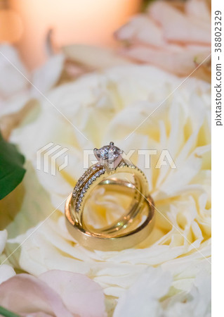 Wedding Rings on Flowers Wedding Rings on Flowers 38802329