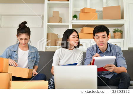 Sme business concept. Young Asian people are packing their packa 38803532