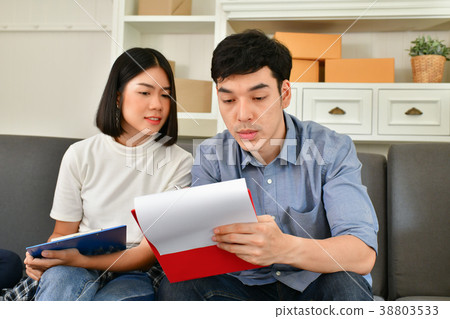 Sme business concept. Young Asian people are packing their packa 38803533