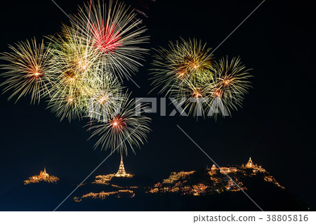 Landscape Scene of multicolor Fireworks annual festival over the Phra Nakhon Khiri (Khao Wang) which is ancient one of the landmark in Phetchaburi Province Thailand. Celebration concept Landscape Scene of multicolor Fireworks annual festival over the Phra Nakhon Khiri (Khao Wang) which is ancient one of the landmark in Phetchaburi Province Thailand. Celebration concept 38805816