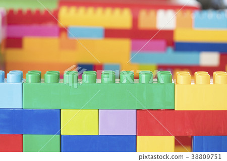 Colorful stacked toy plastic building blocks 38809751