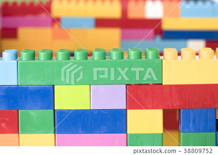 Colorful stacked toy plastic building blocks 38809752