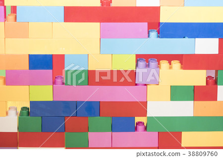 Colorful stacked toy plastic building blocks 38809760