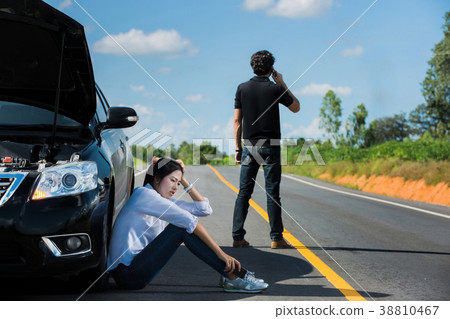 Car broken street Man telephone call insurance. 38810467