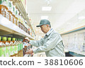 Senior man working as a manager at a supermarket (product replenishment) 38810606