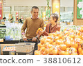 Senior couple shopping at supermarkets 38810612