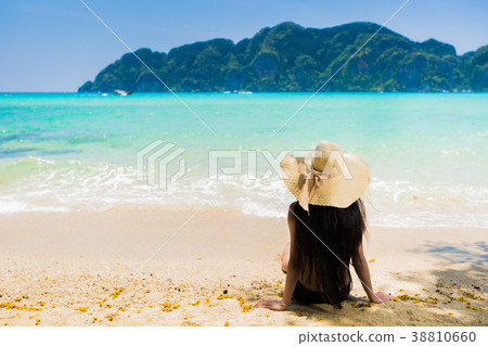 Asian women Sitting on the beach at Koh Phi Phi 38810660