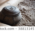 Iron jar in the hearth 38813145