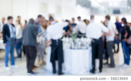 Blured image of businesspeople at coffee break at 38813604