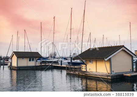 Marina with yachts and floating houses 38813839