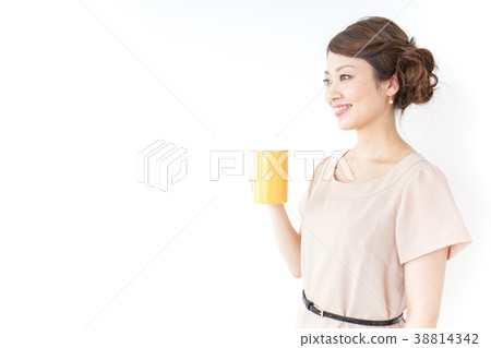 A woman with a mug A woman with a mug 38814342