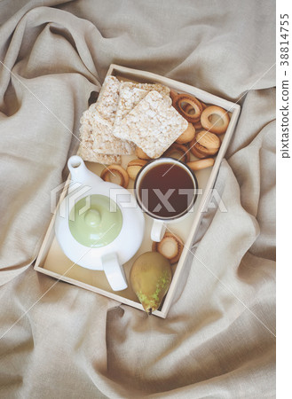 Breakfast in bed in a wooden tray Breakfast in bed in a wooden tray 38814755