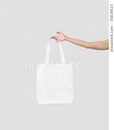hand holding bag canvas fabric for mockup template 38816613
