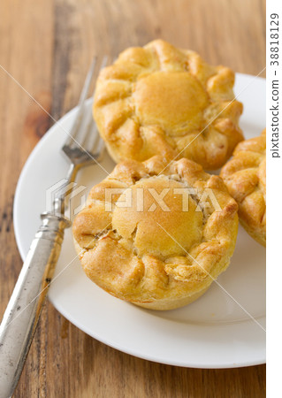pie with chicken on white plate  38818129