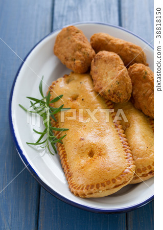 typical portuguese appetizers on white dish  38818150