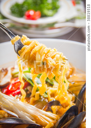 noodles with meat in soup 38819318