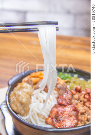 noodles with meat in soup 38819740
