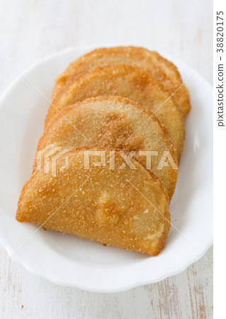 portuguese meat cookies on white dish  38820175