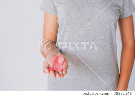 womaen holding pink ribbon breast cancer awareness womaen holding pink ribbon breast cancer awareness 38821148