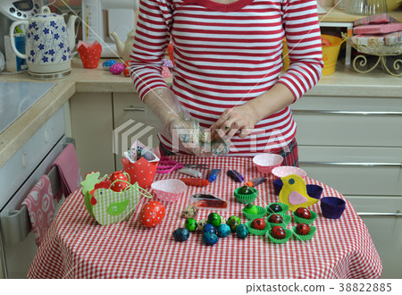 Woman Painting Easter Eggs Woman Painting Easter Eggs 38822885