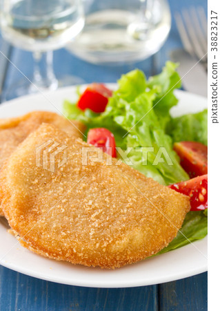 portuguese meat cookies with fresh salad  38823217
