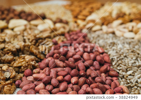 Nuts mix in a canvas bag in table. 38824949