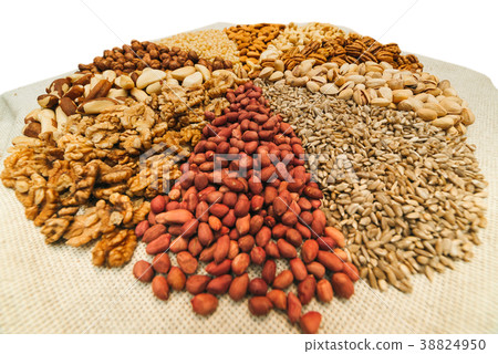 Nuts mix in a canvas bag in table. Nuts mix in a canvas bag in table. 38824950