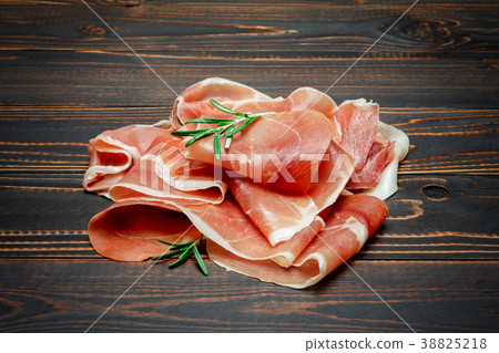 Italian prosciutto crudo or spanish jamon. Raw ham Italian prosciutto crudo or spanish jamon. Raw ham 38825218