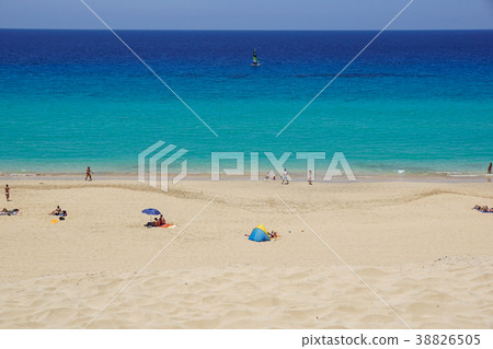 Sand dune and coastal promenade along a beach in Sand dune and coastal promenade along a beach in 38826505