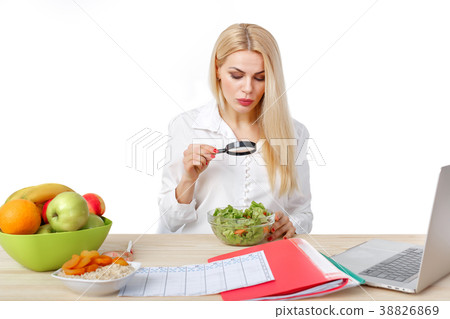 dietician making a diet of fruits and vegetables 38826869