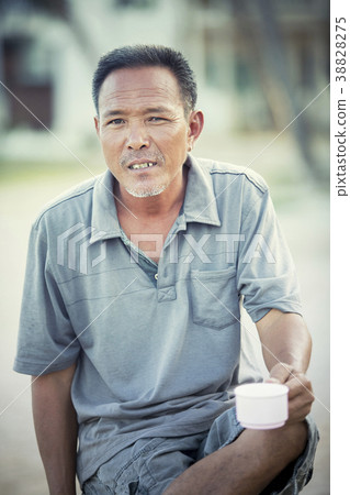 face of asian man relaxing emotion face of asian man relaxing emotion 38828275