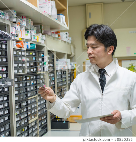 Pharmacist dispensing room pharmacy drugstore medical image Pharmacist dispensing room pharmacy drugstore medical image 38830355