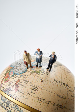 Globe and miniature doll 38831040