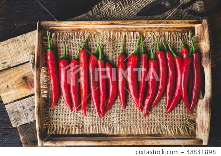 Red chillies on the old wood Red chillies on the old wood 38831898